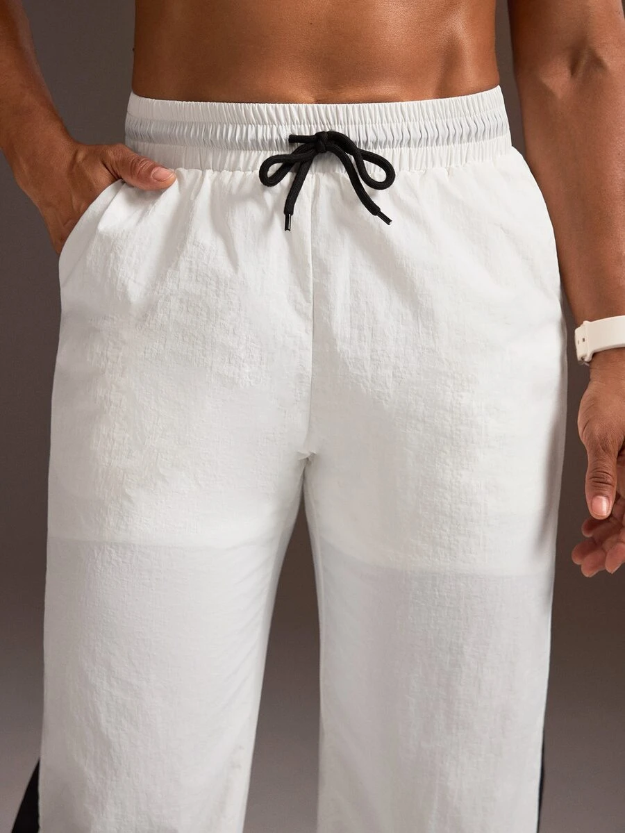 Powerista Women's Black & White Colorblock Woven Loose Wide Leg Long Pants - Black and White - View 1