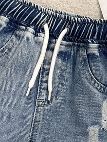 SHEIN 女童街頭風戶外百搭熱銷美式休閒百搭極簡水洗錐腳牛仔長褲 2025 全季新款適合日常穿著 - 中等水洗藍 - 查看 4