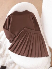 女童針織套裝 優雅溫柔 秋冬新款 小女孩時尚 重工手工蝴蝶結裝飾 棕色套裝 柔軟百搭 圓領 正肩 長袖開襟針織衫 + 百褶裙 2件套 女孩時尚 百搭甜美 慵懶風 適合日常穿著 秋冬針織衫 - 棕色 - 查看 2