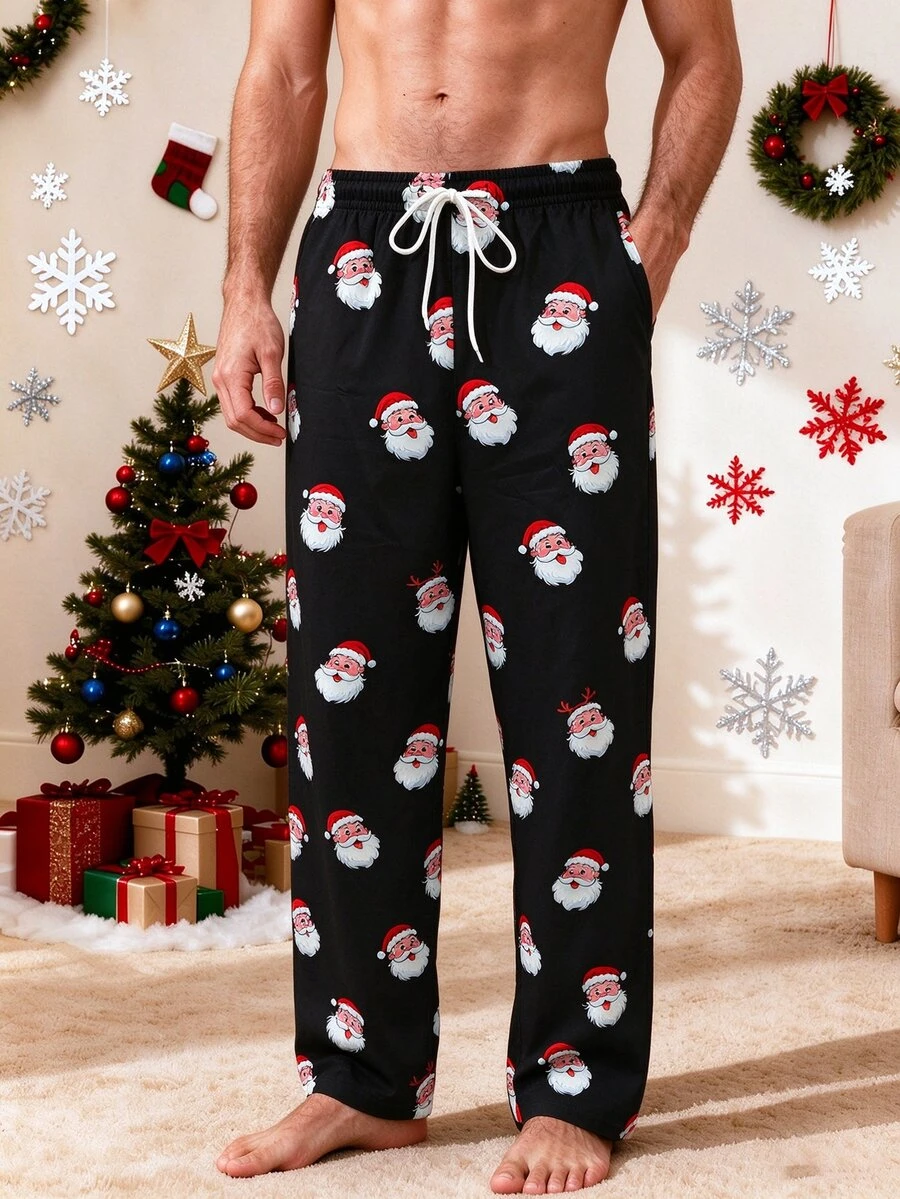 Manfinity Homme بنطال طويل كاجوال للرجال بطبعة بابا نويل وخصر برباط سحب - الأسود - مشاهدة 1