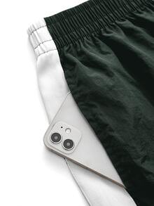 SHEIN Cheerettes 女款純色百褶休閒百搭日常旅行運動長褲 黑白色 寬鬆版型 寬腿 側條紋 鬆緊腰 雙口袋 - 墨綠色 - 查看 7