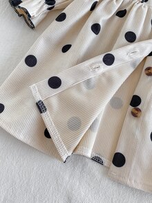 SHEIN Đầm bé gái chập chững chấm bi màu kem đen, phong cách dễ thương ngọt ngào, đính cúc, bèo nhún, tay dài xòe, cổ tròn, dáng vừa vặn, cho tiệc sinh nhật mùa thu, kiểu công chúa ấm áp gân tăm - Đen và trắng - Xem 7