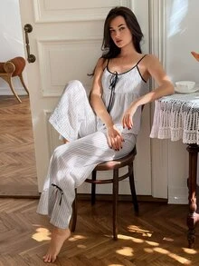 DAZY طقم بيجامة نسائي مكون من توب كاميسول بحمالات وبنطلون طويل مخطط - أبيض - مشاهدة 1