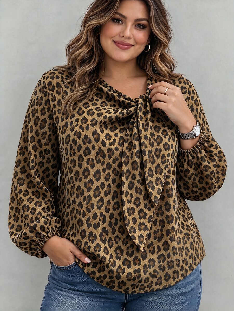 Ceyna بلوزة كاجوال متعددة الاستخدامات للمناسبات والتنقل اليومي، مقاس كبير، منسوجة بطبعة نمر، بياقة دائرية وربطة أمامية وتجاعيد، بأكمام طويلة - الأسود - مشاهدة 1