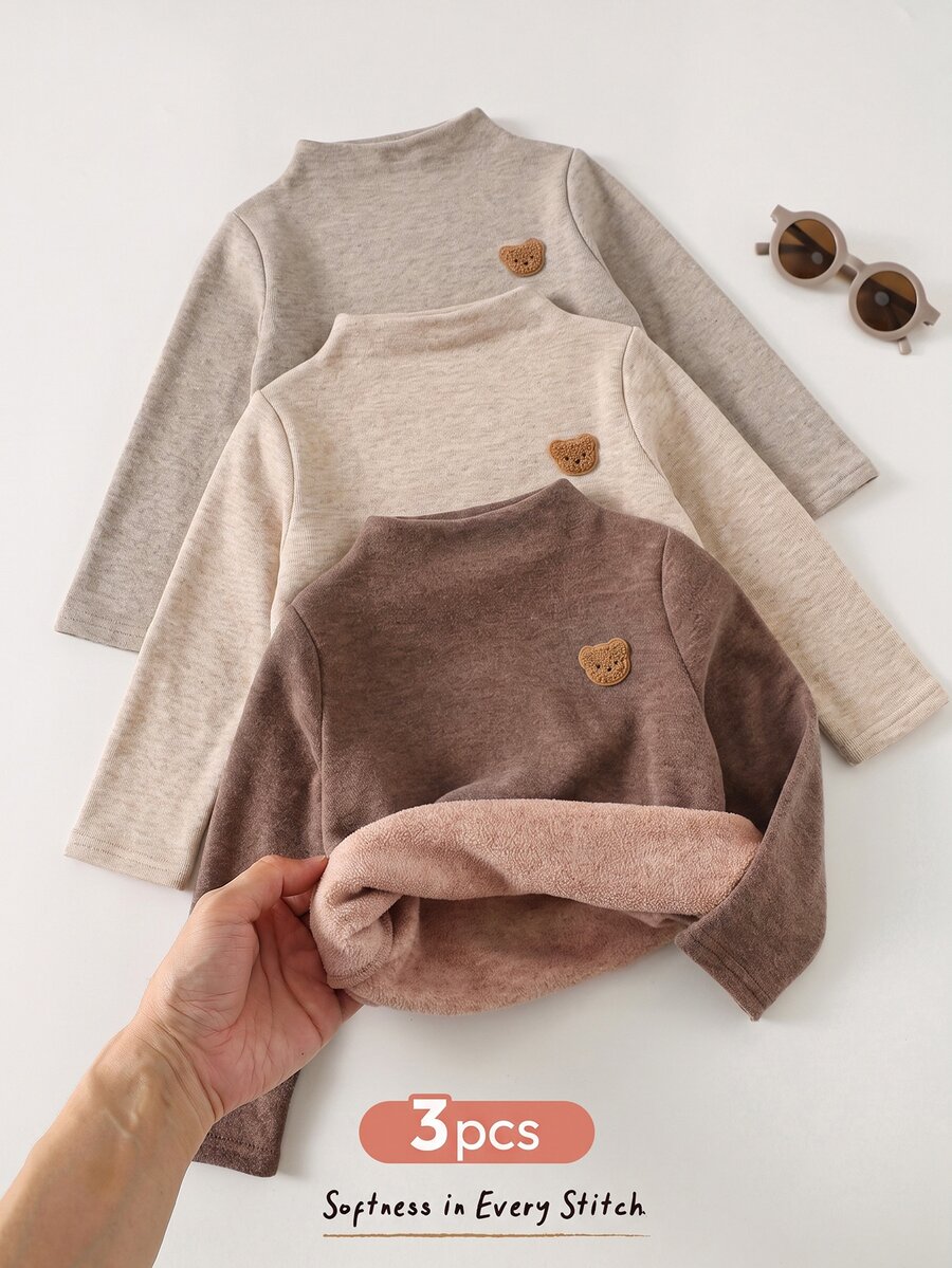 Cozy Pixies مجموعة ملابس علوية للأطفال والأولاد الصغار، 3 قطع، بلون سادة ومخطط، محبوكة وناعمة، برقبة دائرية وأكمام طويلة، متعددة الاستخدامات ومريحة، مناسبة للخريف/الشتاء - متعدد الألوان - مشاهدة 1