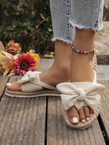 女士蝴蝶结装饰平底凉鞋，圆头套脚夏季鞋，轻便女士沙滩拖鞋，舒适时尚女士人字拖