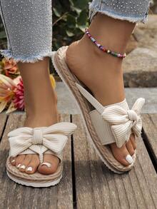 女士蝴蝶结装饰平底凉鞋，圆头套脚夏季鞋，轻便女士沙滩拖鞋，舒适时尚女士人字拖