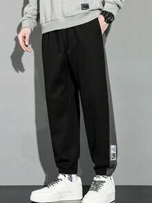 Plus Size Men Letter Print Drawstring Waist Casual Jogger Sweatpants - Black - View 1
