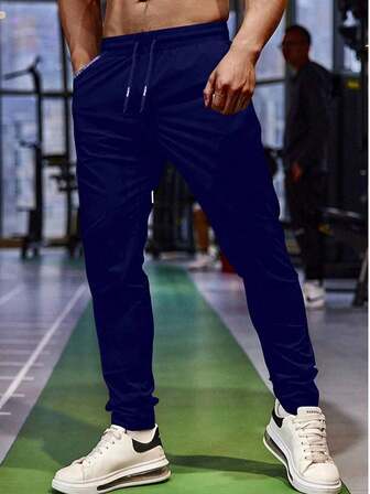 男友款男士抽绳腰拉链口袋运动裤，男士拉链口袋冰丝透气健身运动裤，适合日常穿着、健身房跑步锻炼，适合男朋友丈夫