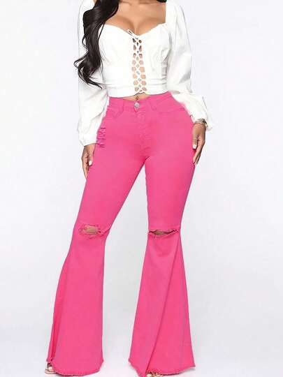 Pantalón Rosa Neón Campana, Diseño Rotos Desgastados y Corte Acampanado - Estilo Y2K, Juvenil y Atrevido para Mujer, Combina con Blusa Blanca de Encaje