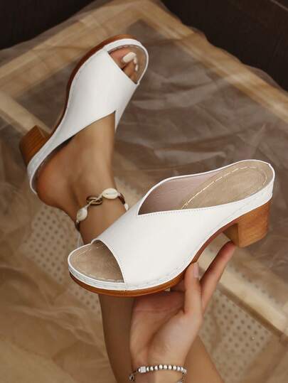 This Is A Pair Of Women's Fashionable Chunky Heel White Sandals. The Sole Material Is Polyurethane, The Insole Is PPU Foam Pad, And The Upper Is Made Of Shiny PU Material. Fashionable And Casual. Versatile Design For Women.