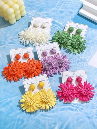 1 paire de boucles d'oreilles d'été en raphia tressé à motif de marguerite pour femmes, élégantes, de style européen et américain, convenant pour la plage, les vacances, le style boho