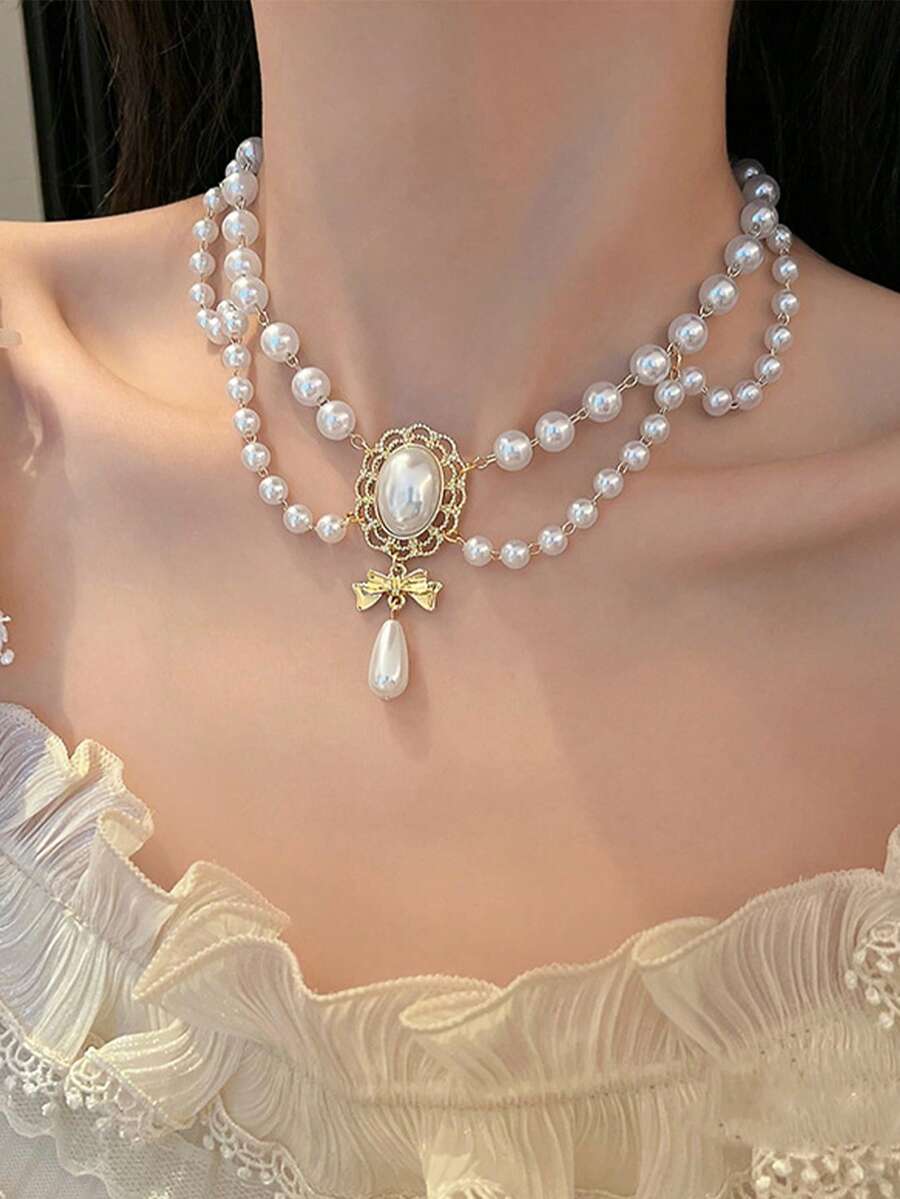 这款洛丽塔风格的复洛克仿珍珠流苏项链用途广泛，适合女士晚宴、舞会、婚礼及各种场合佩戴。它既是理想的装饰配饰，也是一条精美的项链。 - 白色 - 查看 1