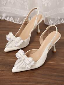 秋冬新款时尚女士高跟鞋，仿珍珠蝴蝶结玻璃杯鞋跟透明尖头，优雅派对鞋