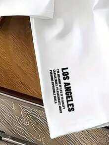 男士休闲涤纶 T 恤，带有几何洛杉矶图案，圆领设计，弹性面料，常规版型，适合夏季穿着。