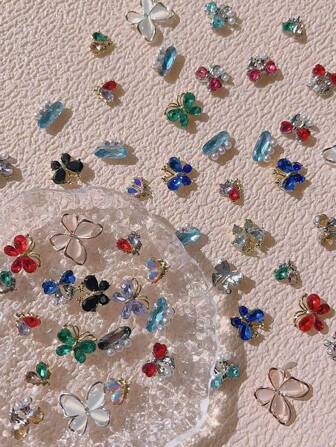 10 piezas Nuevas decoraciones de arte de uñas con mariposas de rhinestone, accesorios de joyería de uñas DIY 3D brillantes de aleación de colores, suministros de uñas, encantos de uñas, gemas de uñas