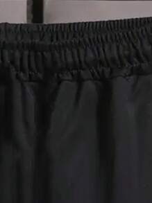 Pantaloncini sportivi casual e ampi per ragazzi, adatti per la primavera e l'estate.
