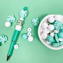 Juego de 25/30/33/34 piezas de cuentas de silicona, adecuado para hacer joyas DIY - Cuentas de enfoque para bolígrafos, collares y llaveros - Juego de cuentas de regalo artesanal, apropiado para hacer joyas, cuentas espaciadoras - Serie de hojas DIY - Ver 7