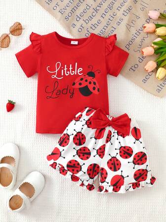 女の子の夏用カジュアルアウトフィット 2点セット: キャップスリーブ丸首パフスリーブてんとう虫Tシャツ(リボン付き)&てんとう虫柄フリルショーツ、4-7歳向け