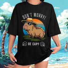 Playera Unisex Oversize con Estampado de Capibara Dont worry be Capy | Diseño Urbano y Comodo | Streetwear, Festivales y Uso Diario | Algodón Peinado y Corte Holgado  | Ideal para Outfits Casuales, Fiestas o Regalos - Negro - Ver 1