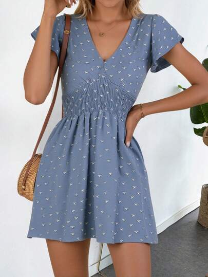 Vestido corto de mujer color azul con estampado de aves