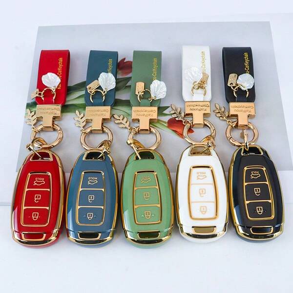 غطاء حافظة مفتاح السيارة من TPU مع سلسلة مفاتيح متوافق مع سانتا في، ل- I30، ل- IX35، ل- Encino، ل- KONA، ل- Solaris، ل- Sonata ل- Azera، ل- Grandeur، ل- Elantra، ل- Accent - حامل ريموت دخول بدون مفتاح واقي من الغبار ومقاوم للسقوط، حقيبة مفاتيح عصرية راقية