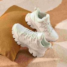 XTEP Zapatos de mujer de algodón, zapatos casuales de invierno de terciopelo cálidos, antideslizantes, con suela gruesa y aumento de altura, zapatos deportivos 876318370007