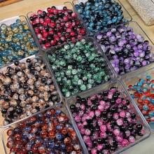 Un set de 50/100/150 cuentas de cristal con efecto de agrietado de colores variados - Cuentas de cristal brillantes redondas de 10mm, aptas para manualidades de joyería, pulseras, collares, aretes - Variedades cuidadosamente seleccionadas, sin necesidad de energía, productos de cuentas de cristal