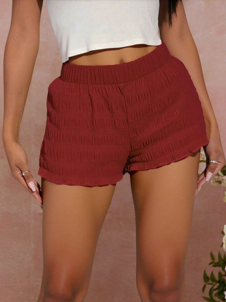 欧美风夏季时尚新款编织纯色低腰休闲红色短裤。