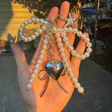 Unisex Y2k Cute Bead Bow Pendant, Fashionable Heart-Shaped Large Size Bag Pendant, Silver Heart-Shaped Rotating Hook Buckle Design, Spring Buckle, Starfish, Bow, And Heart-Shaped Elements Phone Charm Keychain Starfish Phone Charm Keychain, Elegant Accessories For Girls And Women, Bag Accessories, Party And Holiday Gifts, Female College Teacher Gifts, Novel Gifts For Family And Friends - Beige - View 3