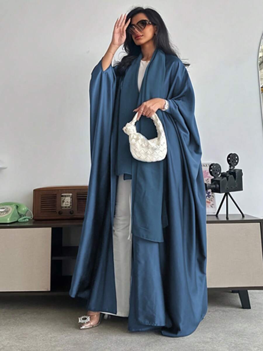 Kiểu dáng Abaya dài tay cánh dơi rộng rãi, màu trơn, kết hợp với khăn trùm đầu Hijab, Kaftan kín đáo cho dịp Eid mùa xuân.