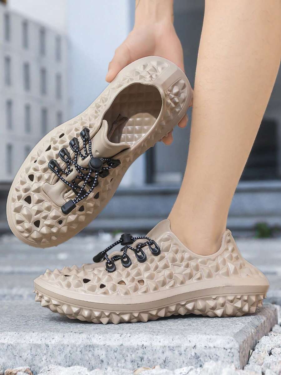 صندل صيفي للرجال من إيفا (الإيثيلين فينيل الاستات) باللون الأحادي، مثقب بثقوب على شكل الأناناس، مانع للانزلاق للاستخدام في الأماكن المفتوحة - كاكي - مشاهدة 1