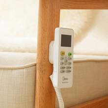 Soporte retráctil para control remoto con cierre magnético - Organizador de cables de  para múltiples controles remotos, diseño de montaje en pared ahorrador de espacio, compatibilidad universal para controles de TV/Aire acondicionado/Ventilador (Blanco/Negro)