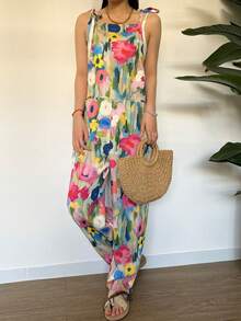 女士超大时尚休闲舒适春夏透气花卉图案浪漫撞色花卉植物印花口袋细节蝴蝶结后裤连体裤女士透气轻便夏季连体裤采用仿亚麻制成。 - 彩色 - 查看 4