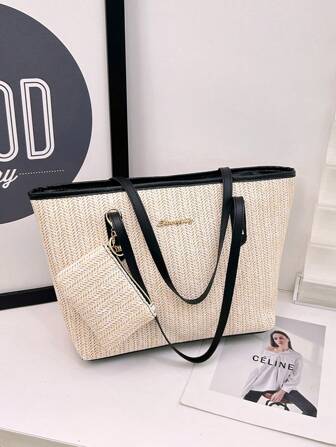 简约别致编织手提包，象牙白与黑色碰撞，经典又不失时尚。搭配同材质小包，细节精致。随身携带，轻松传递日常氛围