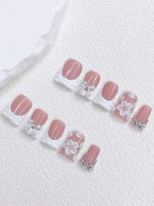 10片Y2K风格红白法式美甲贴片，手工3D立体花朵雕刻鸭嘴美甲贴片，配银色蝴蝶结和水钻装饰，适合日常和派对佩戴，是送给女性和女孩的绝佳礼物。 - 紅白色 - 查看 1