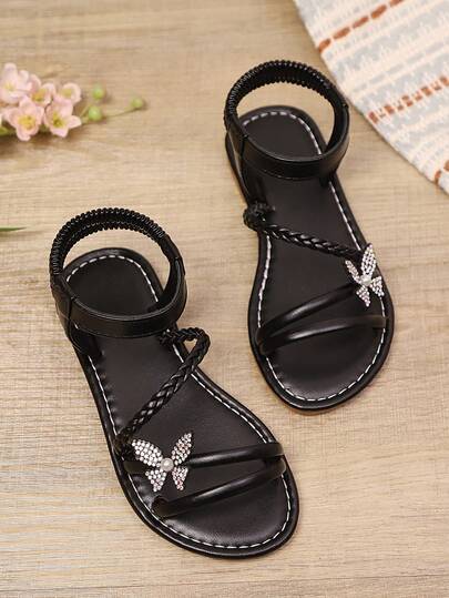 1 Pair Black Plus Size Toddler Girls' Fashion Sandals, Solid Color PU Woven Strap, Shiny Colorful Butterfly Decor, Elastic Ankle Strap, Round Toe Open Toe, Flat Non-Slip Comfortable Elegant Cute Roman Sandals, Suitable For 3-15 Years Old Girls, Daily, Casual, Party, Travel, Spring/Summer 2026