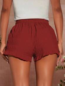 欧美风夏季时尚新款编织纯色低腰休闲红色短裤。