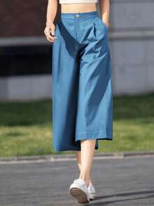 女士纯色口袋休闲可爱通勤阔腿宽松七分裤，适合夏季日常休闲、户外和度假穿着