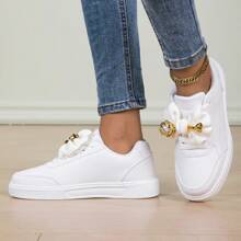 Baskets décontractées pour femmes avec lacets, décor de fleur dorée et nœud. Chaussures polyvalentes confortables et antidérapantes, idéales pour les événements extérieurs et le port quotidien, toutes saisons