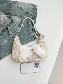 新款春夏时尚蝴蝶结围巾装饰手提包、草编单肩包、休闲新月形单肩包（配仿珍珠链）、优雅女包、沙滩必需品、沙滩必备品、沙滩用品和夏季必需品