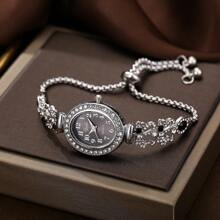 1 pieza Reloj de pulsera de cuarzo con esfera oval de números, elegante y con diamantes de imitación, con correa ajustable