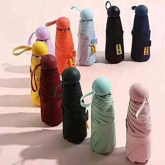 这款专为女性设计的紧凑型折叠伞，便携式两用迷你口袋伞采用190T防晒面料，六骨铁架，手动开合，塑料手柄，休闲可爱的基本款。夏季清凉，沙滩，旅行