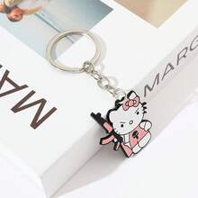 1 Stück Hello Kitty Schlüsselanhänger mit rosa Revolver Design - süßer Anime Schlüsselanhänger aus Edelstahl, geeignet für Taschen, Rucksäcke und Autoschlüssel, das perfekte Geschenk für Fans von Sanrio Charakteren
