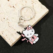 1 Stück Hello Kitty Schlüsselanhänger mit rosa Revolver Design - süßer Anime Schlüsselanhänger aus Edelstahl, geeignet für Taschen, Rucksäcke und Autoschlüssel, das perfekte Geschenk für Fans von Sanrio Charakteren