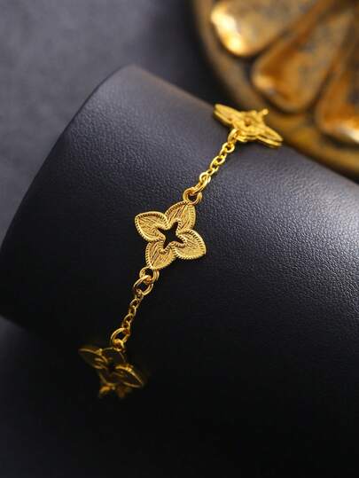 1 件轻质奢华金色镂空三叶草设计金属女士手链