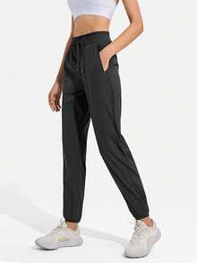 Women Lightweight Loose Sports Pants With Pockets, Suitable For Summer Exercise & Casual Wear, Stretchy Solid Color