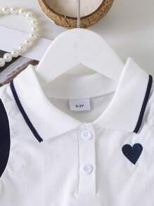 Conjunto de 2 piezas de top sin mangas con cuello polo con bordado de corazón y falda plisada para niñas, para el verano