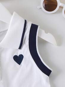 Conjunto de 2 piezas de top sin mangas con cuello polo con bordado de corazón y falda plisada para niñas, para el verano
