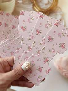 50 piezas Tarjetas de exhibición de joyería con diseño floral para pulseras, collares y lazos para el cabello - Diseño elegante de flores rosa y blancas, de 1,77x4,72 pulgadas, etiquetas de manualidades DIY y suministros para pequeños negocios, etiquetas de precio al por menor | Etiquetas de color pastel | Calidad de impresión vibrante para organizador de almacenamiento de mujeres, artículos esenciales para viajes, regalo - Multicolor - Ver 2